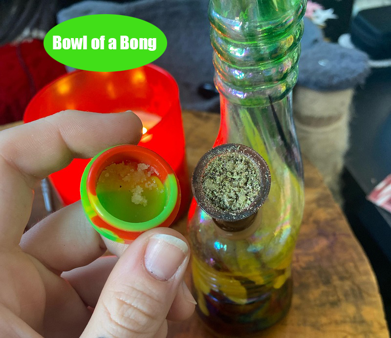 add dabs to the bowl of a bong