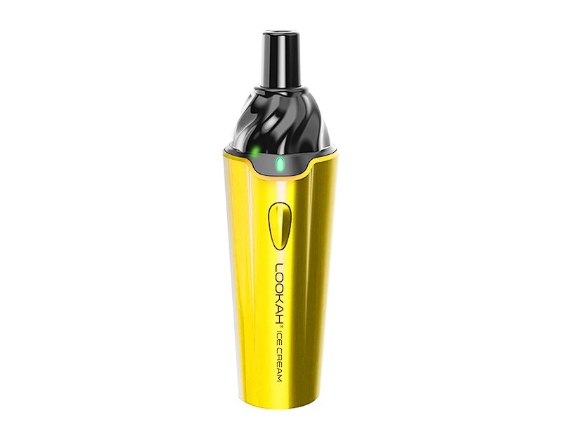 a dry herb vape pen in a gold yellow with black mouthpiece