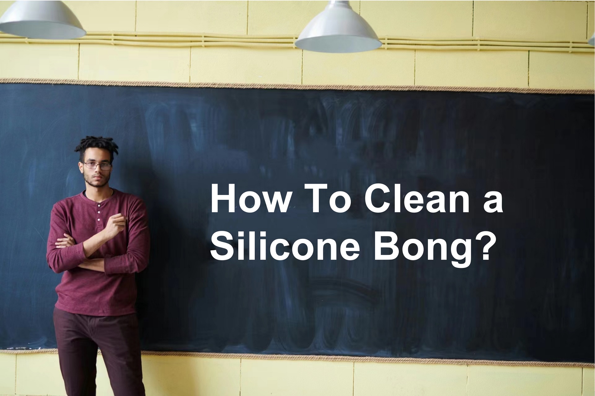 A person next to a blackboard with the text " How to clean a silicon Bong?"