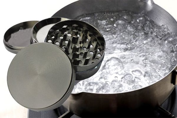 Can you boil your herb grinder to clean it