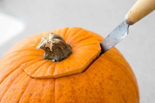 Cut the top of the pumpkin.