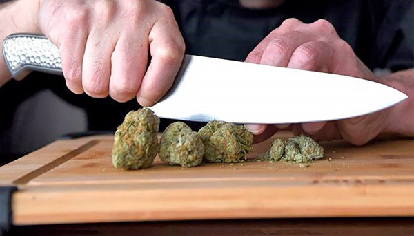 A Knife and Chopping Board grinds marijuana